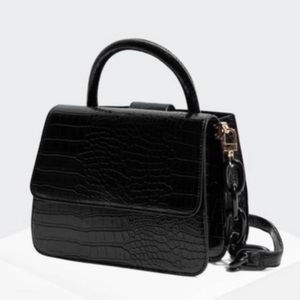 Woke newbie black crow satchel